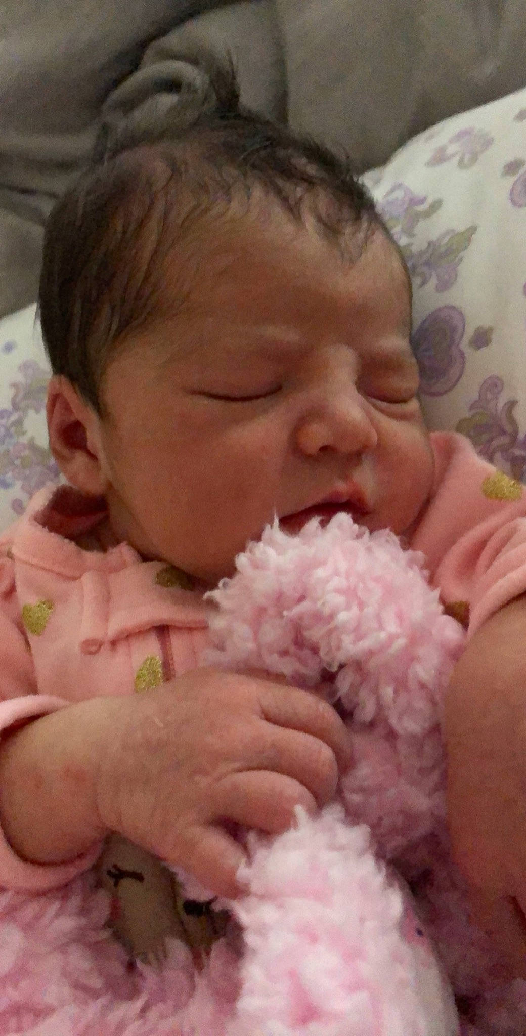 Hazel is registered to the contest to win money with this photo: baby, birth, cheek, child, ear, eye, face, facial_expression, hand, head, mouth, nose, person, pink, skin, smile, toddler