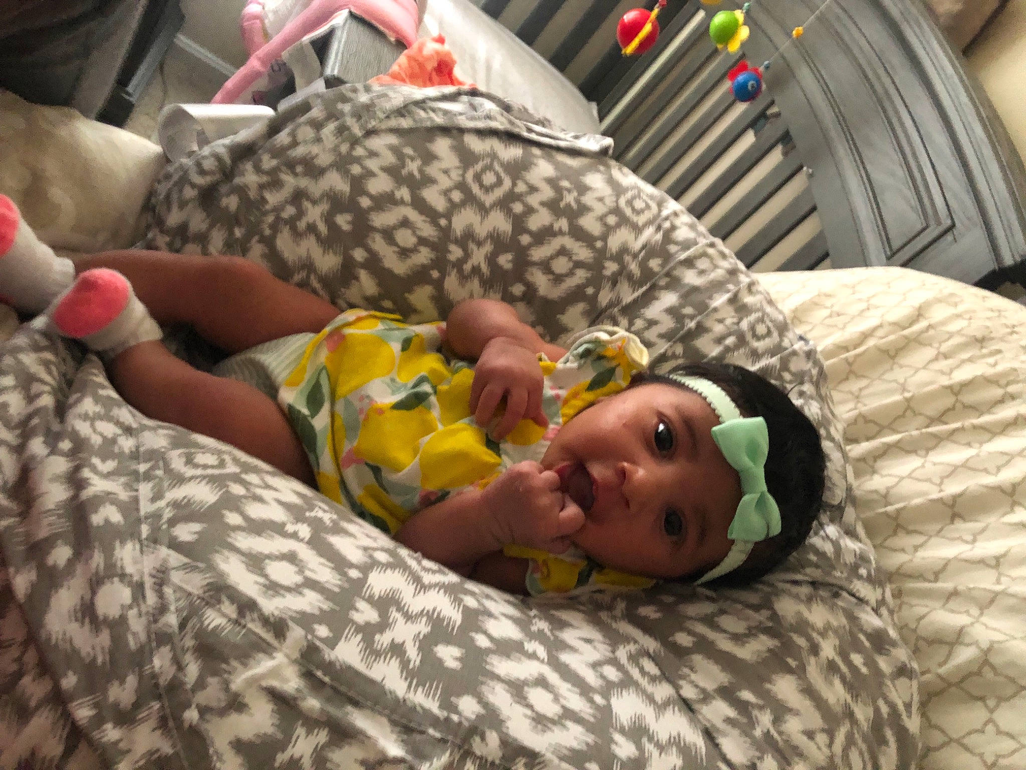 Eviana is registered to the contest to win money with this photo: baby, baby_products, bed, bed_sheet, bedding, bedroom, bedtime, blanket, child, comfort, flooring, fun, fur, headwear, linens, nap, pattern, person, room, sleep