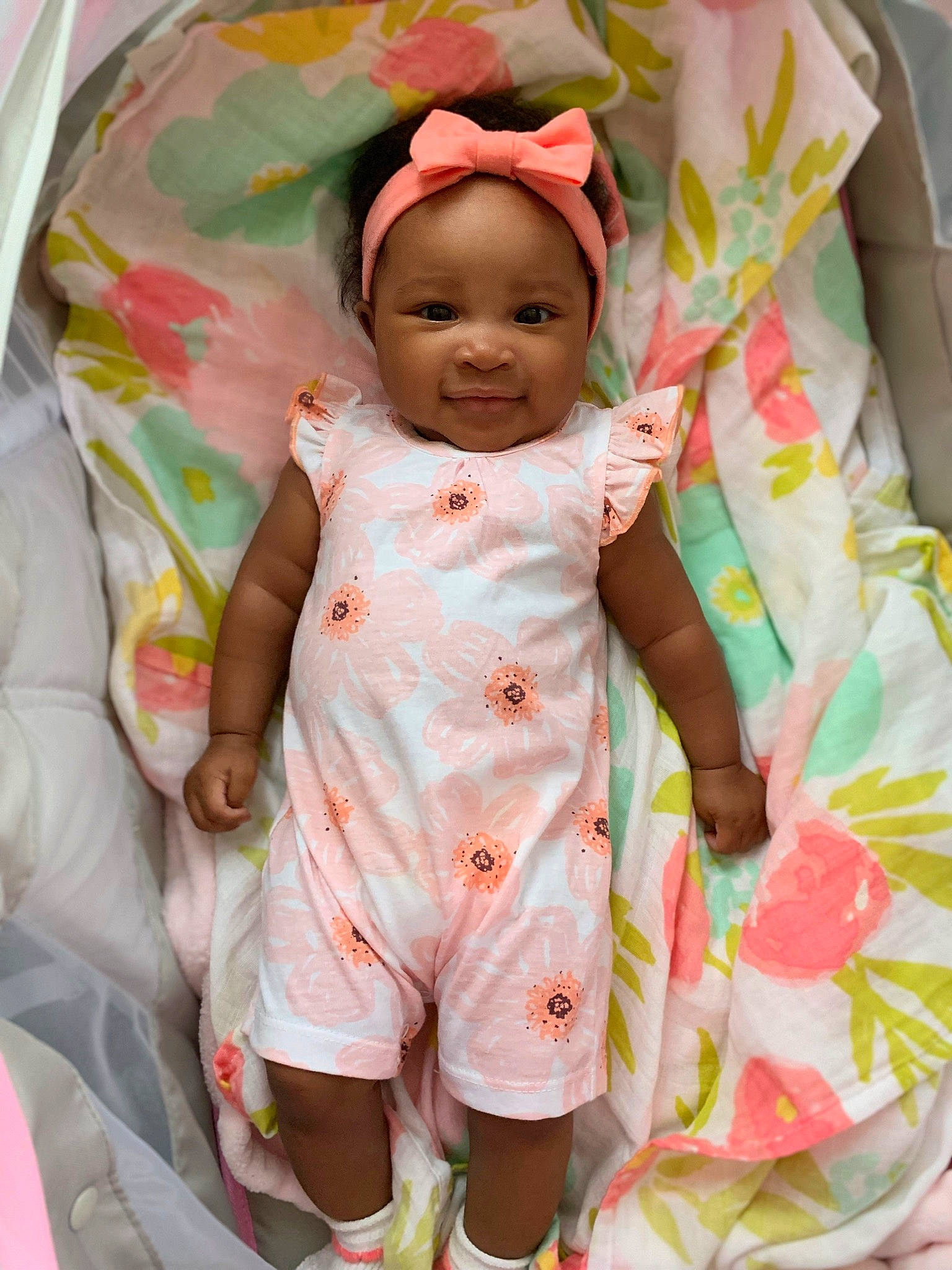 Camryn is registered to the contest to win money with this photo: baby, baby_products, baby_safety, baby_toddler_clothing, cheek, comfort, eye, face, happy, head, headwear, linens, pattern, person, pink, product, skin, sleeve, smile, t_shirt
