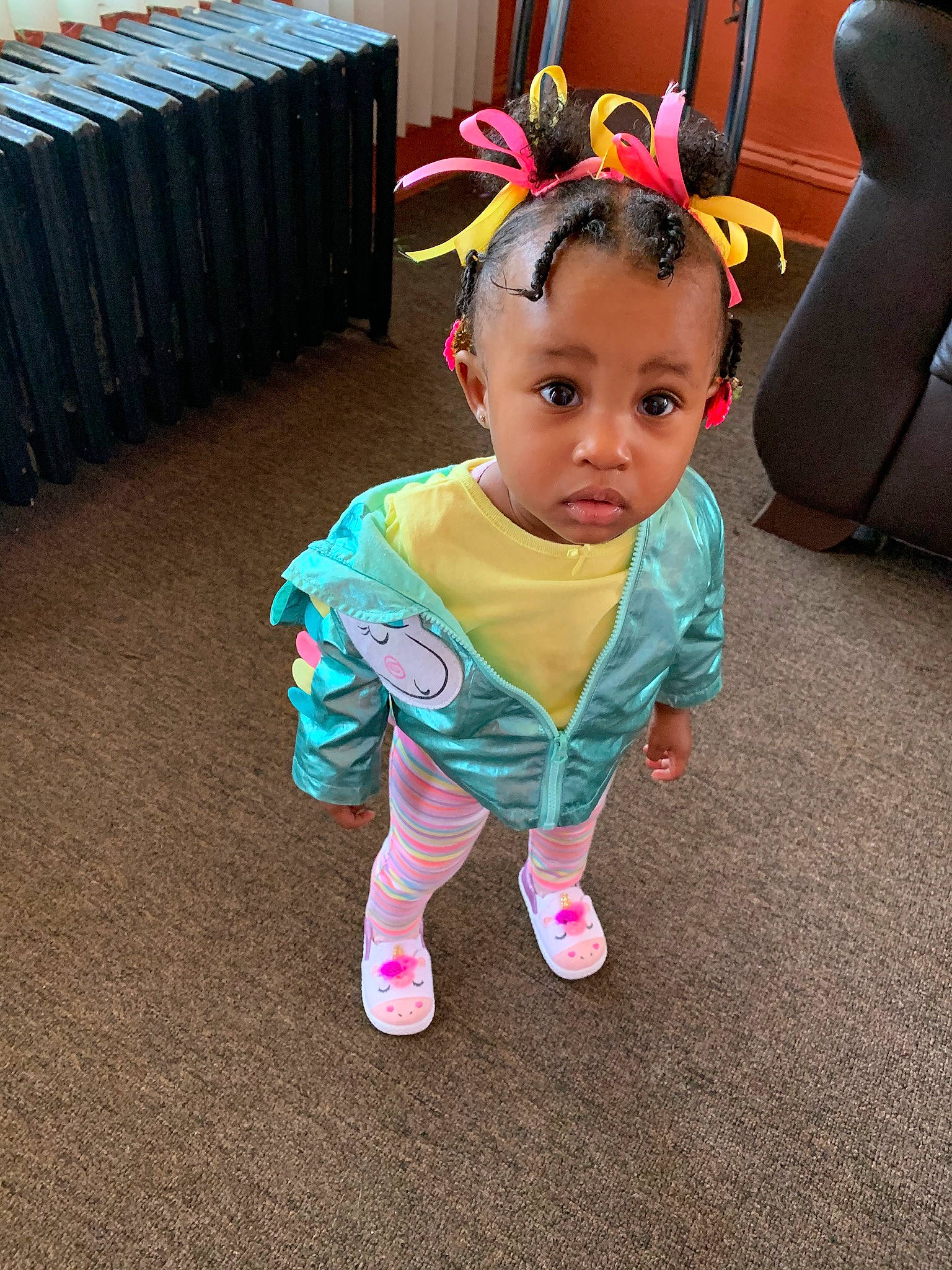 Camryn is registered to the contest to win money with this photo: baby, baby_products, baby_toddler_clothing, chair, child, costume_hat, event, eye, flooring, fun, grass, happy, human_body, magenta, party_supply, person, play, sitting, sleeve, table