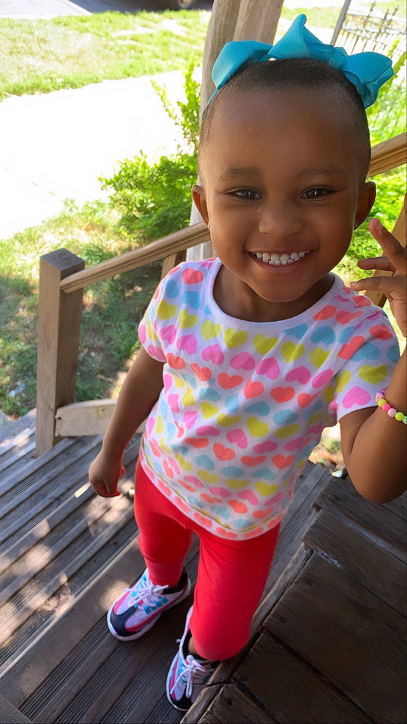 Camryn joined the competition — help win amazing prizes! blue, clothing, cool, eye, fun, grass, hair, hairstyle, happy, head, joy, leisure, organ, person, photograph, pink, plant, skin, smile, standing