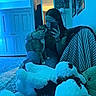 Baboo is registered to the contest to win money with this photo: indoor, person, cat, selfie, phone, plush_toy, stuffed_animal, panda, chair, jeans, long_hair, poster, lamp, door, carpet, blue_light, cuddle, furniture, cozy, casual