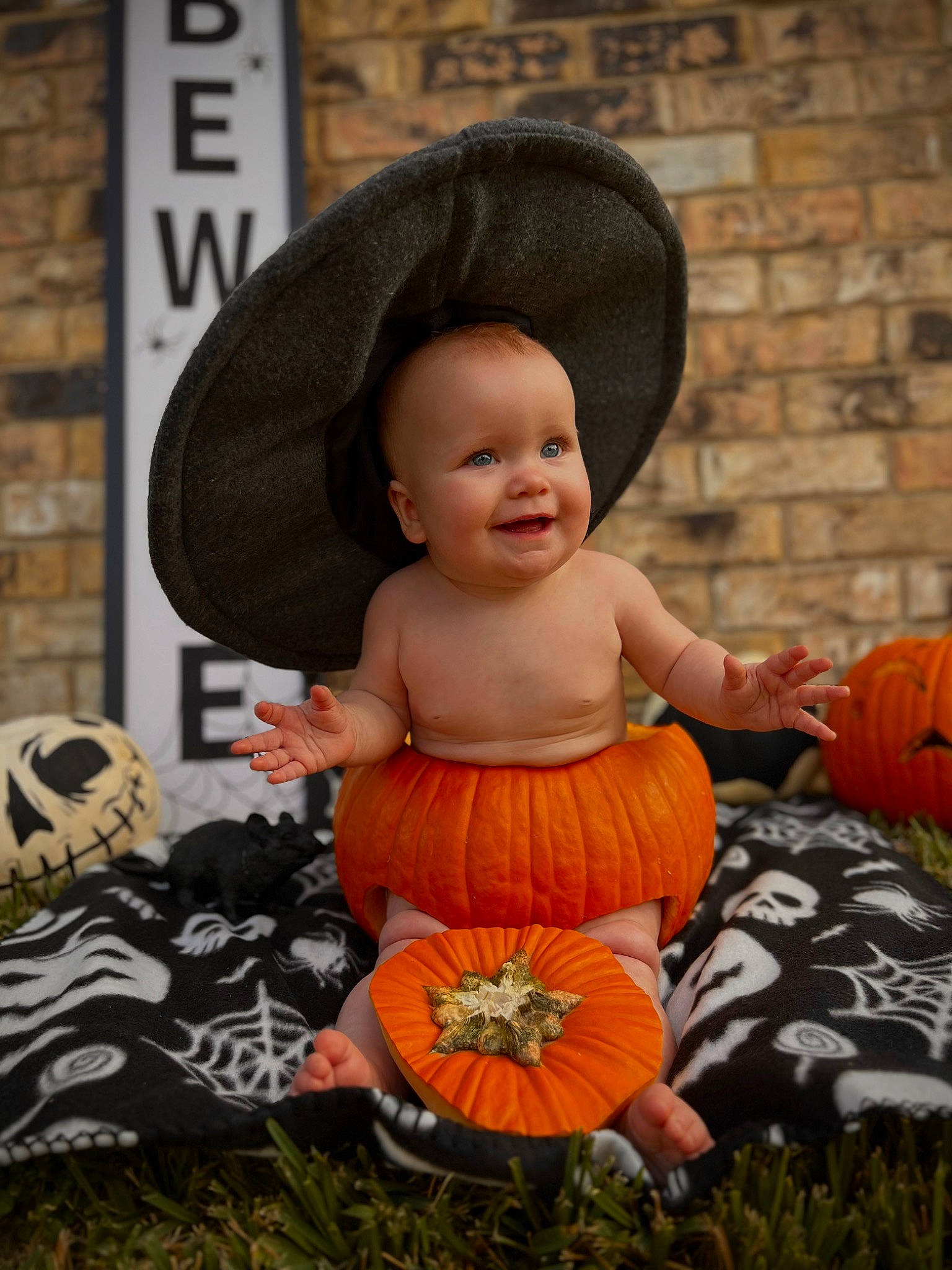 Kayla is registered to the contest to win money with this photo: baby, calabaza, child, cucurbita, dress, fruit, gourd, grass, happy, hat, joy, natural_foods, orange, person, plant, pumpkin, smile, squash, toddler, tradition