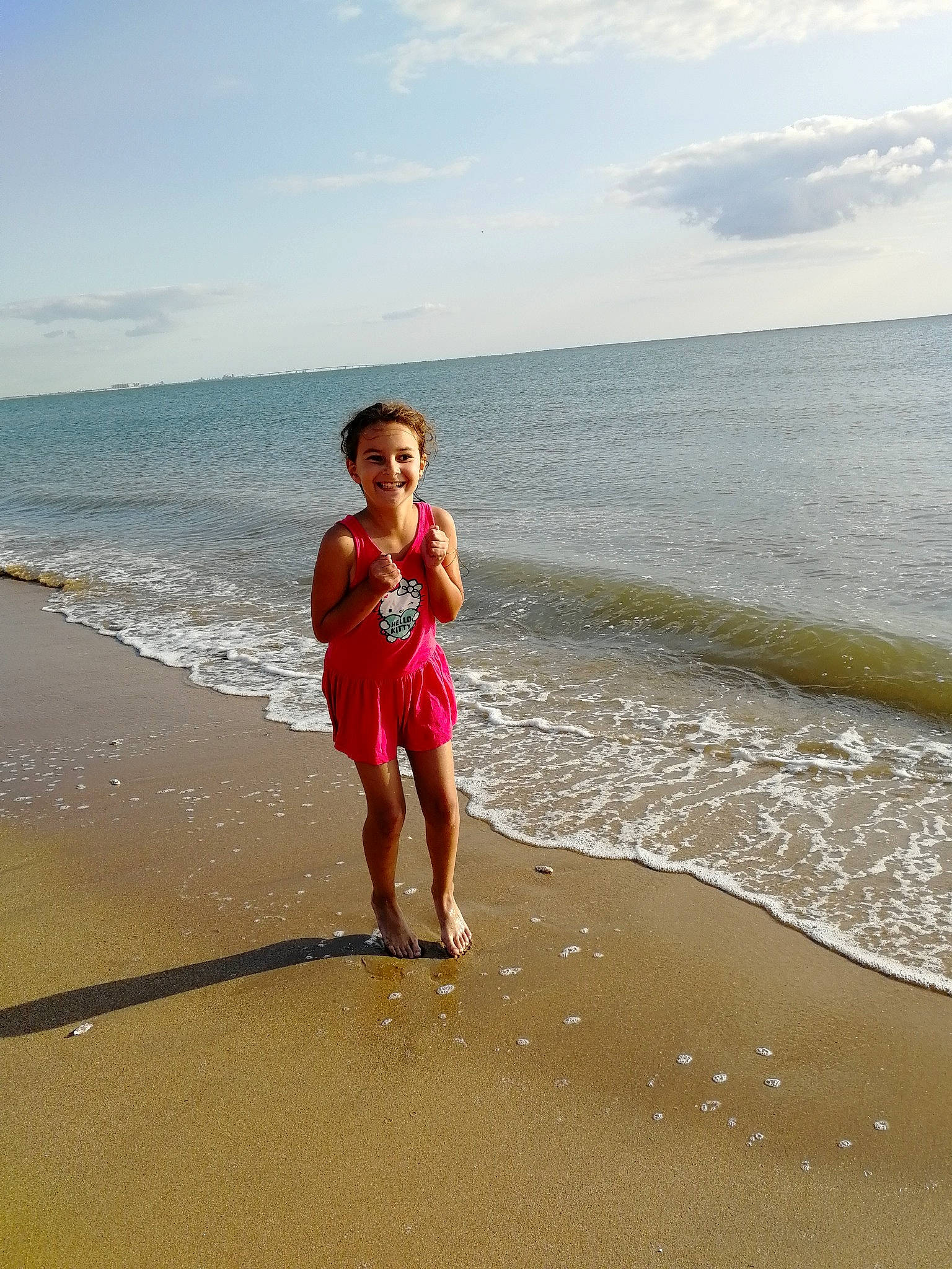 Leïla participe au concours pour gagner de l'argent avec cette photo : azure, barefoot, beach, cloud, coastal_and_oceanic_landforms, fun, happy, holiday, horizon, joy, leg, leisure, people_in_nature, people_on_beach, person, sand, sky, smile, summer, travel