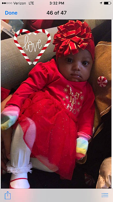 Tater Tot is registered to the contest to win money with this photo: child, girl, hair_accessory, headwear, person, photo_caption, product, red, toddler