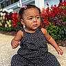 Ryver joined the competition — help win amazing prizes! baby, child, toddler, portrait, sitting, outdoor, garden, flowers, porch, house, polka_dot_outfit, hair_bow, curly_hair, face, eyes, curious, rattle, toy, daylight, photography