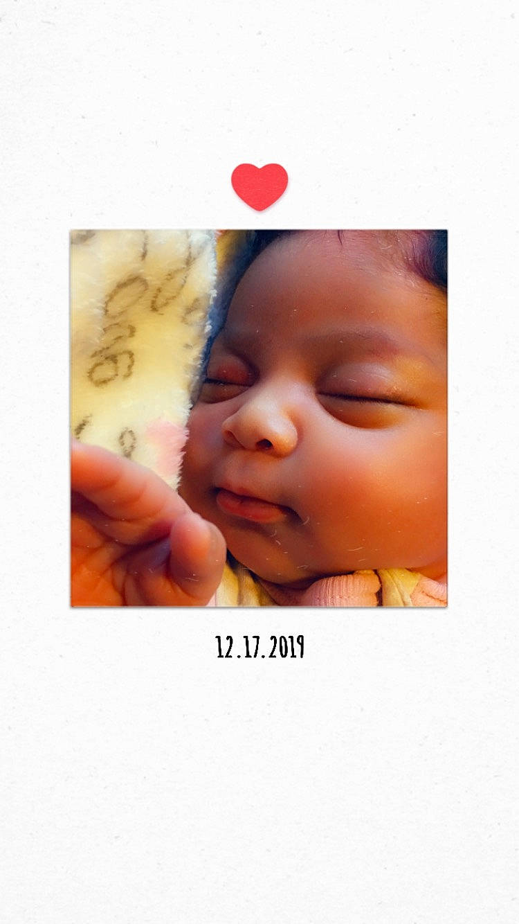 Sanaa joined the competition — help win amazing prizes! baby, bedtime, cheek, child, close_up, face, forehead, gesture, hand, head, lip, mouth, nose, person, photography, skin, smile, text, toddler