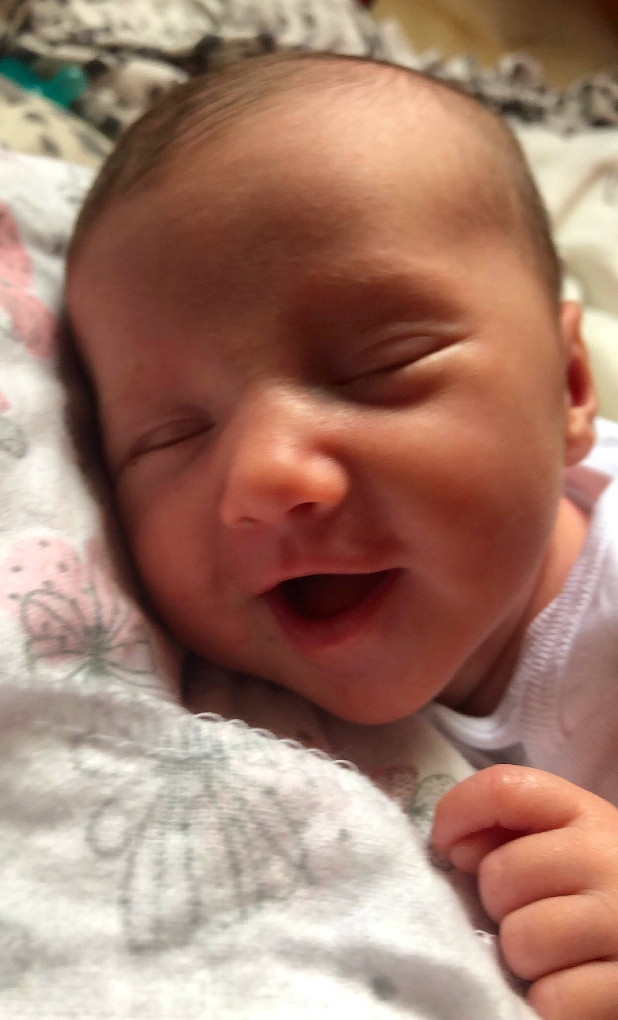 Brooklyn is registered to the contest to win money with this photo: baby, beauty, cheek, chin, close_up, comfort, eyebrow, facial_expression, finger, forehead, happy, iris, lip, mouth, nose, person, pink, skin, smile, thumb