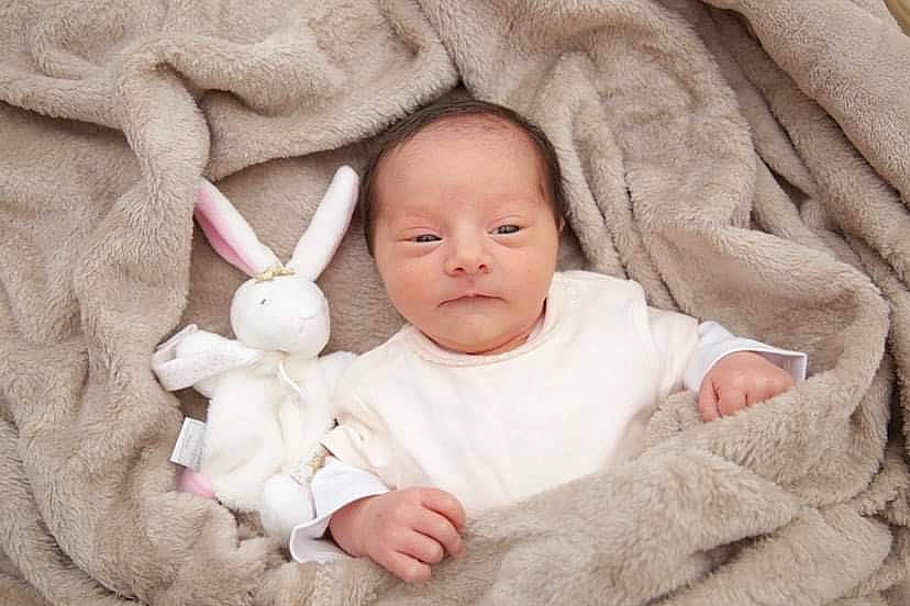 Kaysie participe au concours pour gagner de l'argent avec cette photo : baby, baby_toddler_clothing, beauty, cheek, child, comfort, eye, face, gesture, happy, head, iris, linens, mammal, person, pink, product, skin, sleeve, toddler