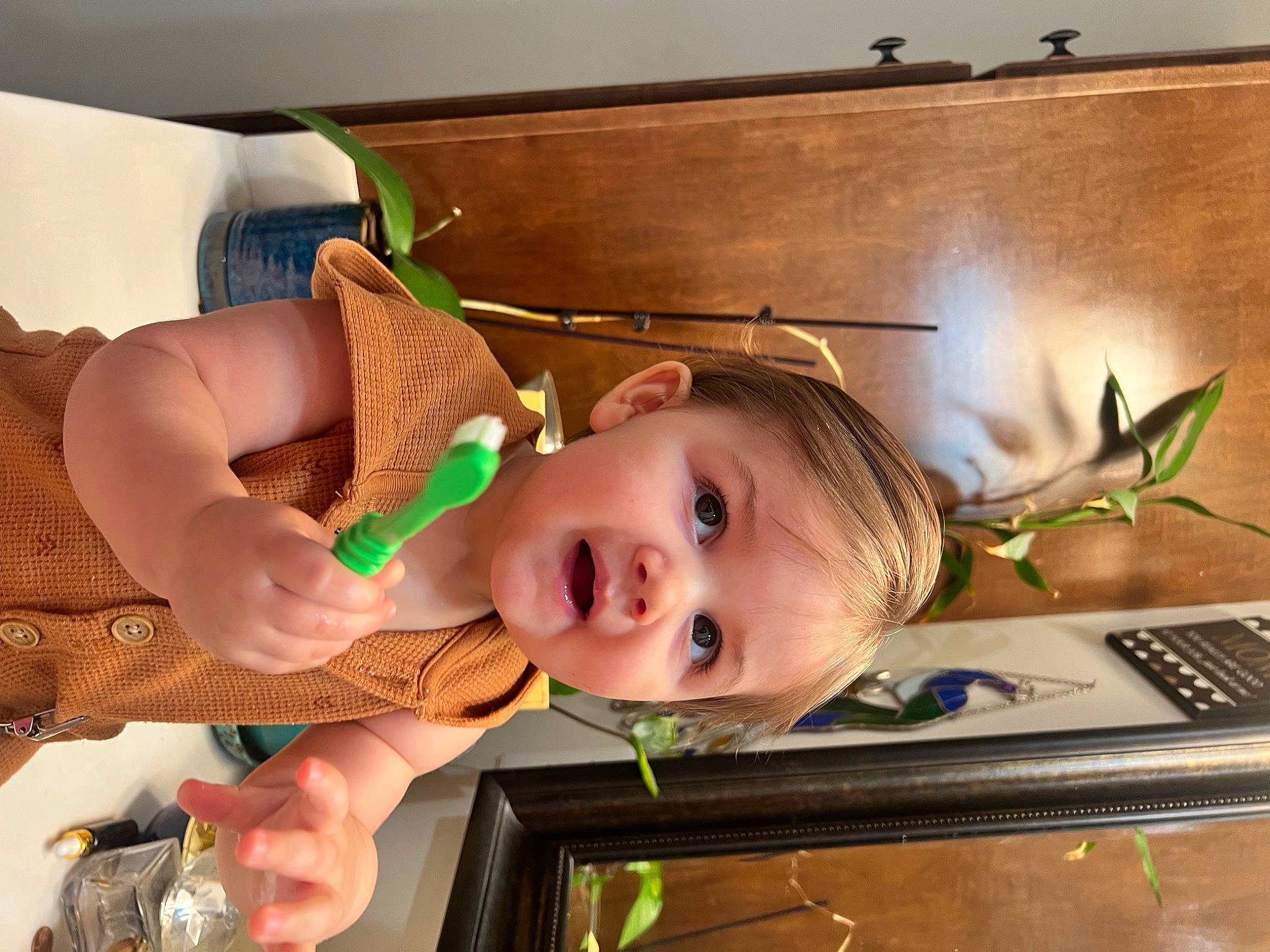 Channing is registered to the contest to win money with this photo: baby, baby_products, cheek, child, drawer, eye, eyelash, fun, happy, hardwood, house, kitchen, netbook, person, room, smile, surprise, tableware, thumb, toddler