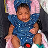 baby, infant, sleeping, car_seat, blue_outfit, headwrap, white_socks, pacifier, pink_cushion, child, cute, cozy, adorable, indoor, soft_texture, peaceful, resting, clothing, seat_belt, portrait