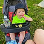 baby, blue_shoes, bucket_hat, child, cute, grass, green_shirt, happy, legs, lollipop, outdoor, park, plastic_tray, seatbelt, snacks, stroller, summer, sunny, toddler, water_bottle
