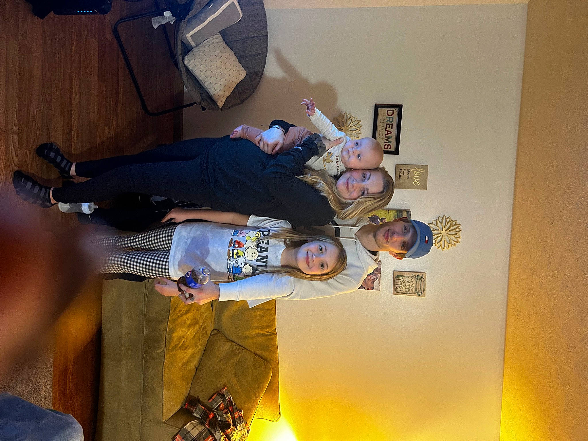 Leo is registered to the contest to win money with this photo: art, event, fun, headwear, joy, person, room, shoe, smile, sneakers, walking_shoe, yellow