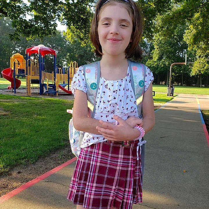 Sophia joined the competition — help win amazing prizes! bulldozer, child, clothing, face, female, girl, grass, head, nature, outdoorplayarea, outdoors, park, person, photography, plant, playarea, portrait, skirt, standing, tree