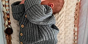 Thaylo a rejoint le concours — aidez-le/la à gagner de superbes lots ! baby, newborn, infant, sleeping, crib, blanket, knitwear, sweater, socks, pacifier, beaded_clip, hand, ear, head, plush, crochet, cozy, indoor, soft_texture, portrait