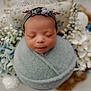 Aniyah joined the competition — help win amazing prizes! newborn, baby, sleeping, wrapped, blanket, headband, flowers, floral, portrait, soft, cute, peaceful, closeup, infant, adorable, decorative, wrapped_in_blanket, flower_arrangement, baby_headband, serene