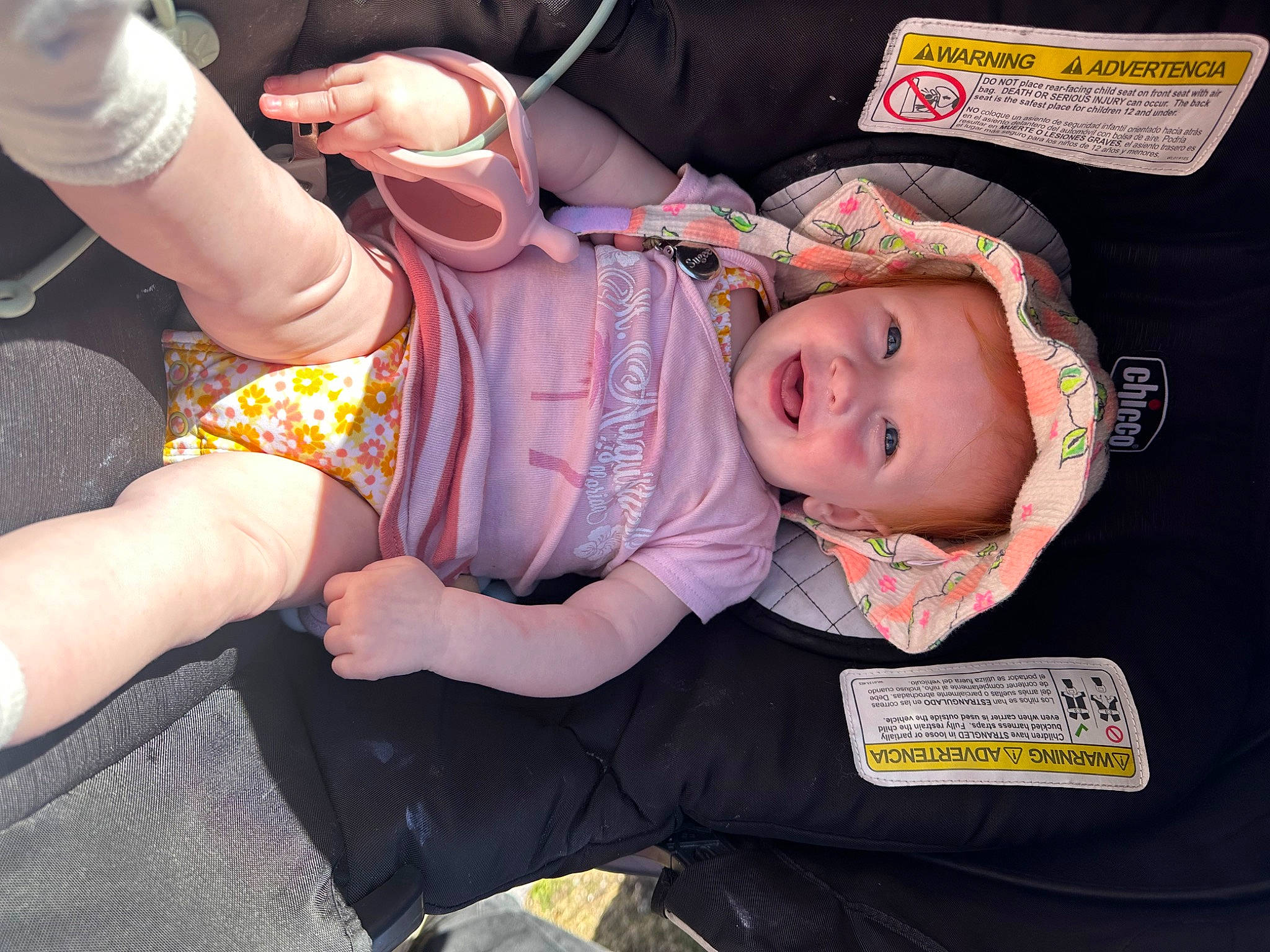 Paige is registered to the contest to win money with this photo: baby, baby_carriage, baby_products, baby_toddler_clothing, cheek, child, comfort, eye, fun, gesture, hand, happy, human_leg, nail, person, sitting, smile, thigh, thumb, toddler