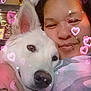 Snow White is registered to the contest to win money with this photo: person, dog, white_dog, face, ears, snuggling, closeup, selfie, pink_hearts, sparkles, indoors, cute, love, affection, pet, animal, portrait, happy, smiling, nose
