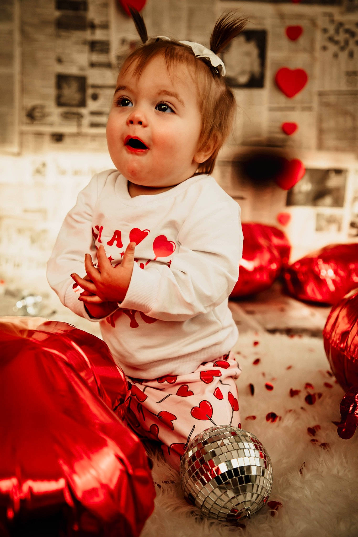 Serenity is registered to the contest to win money with this photo: baby, baby_toddler_clothing, child, dress, event, eye, face, facial_expression, flash_photography, flooring, fun, happy, monochrome_photography, person, photograph, red, sitting, sleeve, smile, snapshot