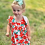 child, toddler, girl, bow, blonde_hair, blue_eyes, floral_dress, outdoor, grass, summer, cute, portrait, smile, walking, happy, fashion, nature, sunlight, playful, person