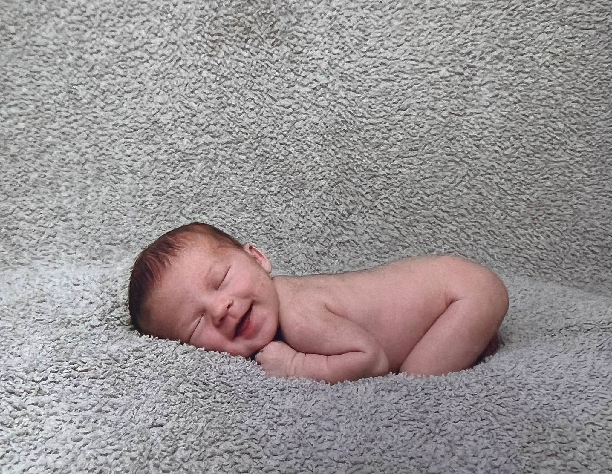 Amara is registered to the contest to win money with this photo: art, baby, barefoot, child, comfort, flesh, flooring, foot, head, human_leg, linens, person, portrait_photography, sleep, toddler, wood