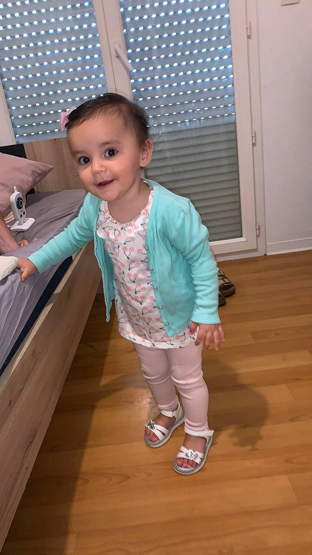 Maliya participe au concours pour gagner de l'argent avec cette photo : arm, baby_toddler_clothing, child, flooring, fun, happy, hardwood, human_leg, joint, joy, knee, leg, leisure, person, shoulder, skin, sleeve, smile, sock, thigh