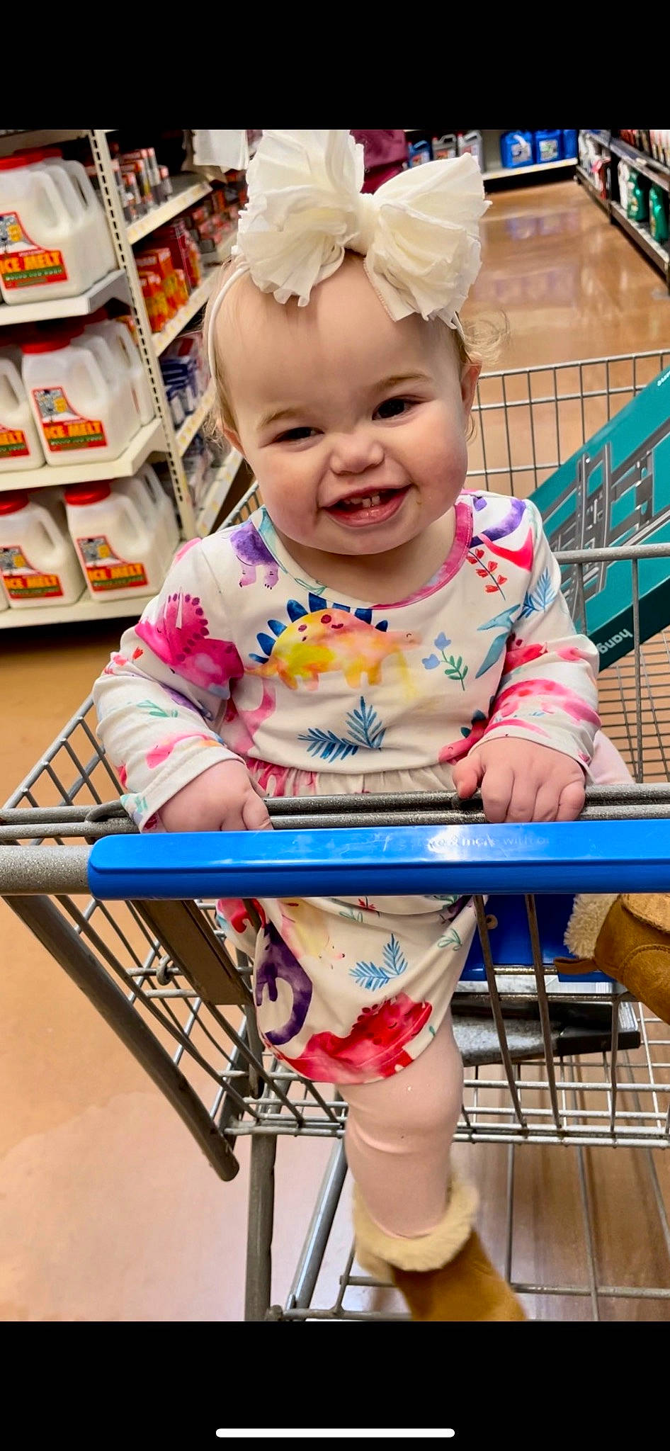 Morrelli joined the competition — help win amazing prizes! baby, baby_toddler_clothing, cheek, child, dress, eye, fun, happy, iris, joy, leisure, mouth, person, pink, product, shelf, sitting, skin, sleeve, smile