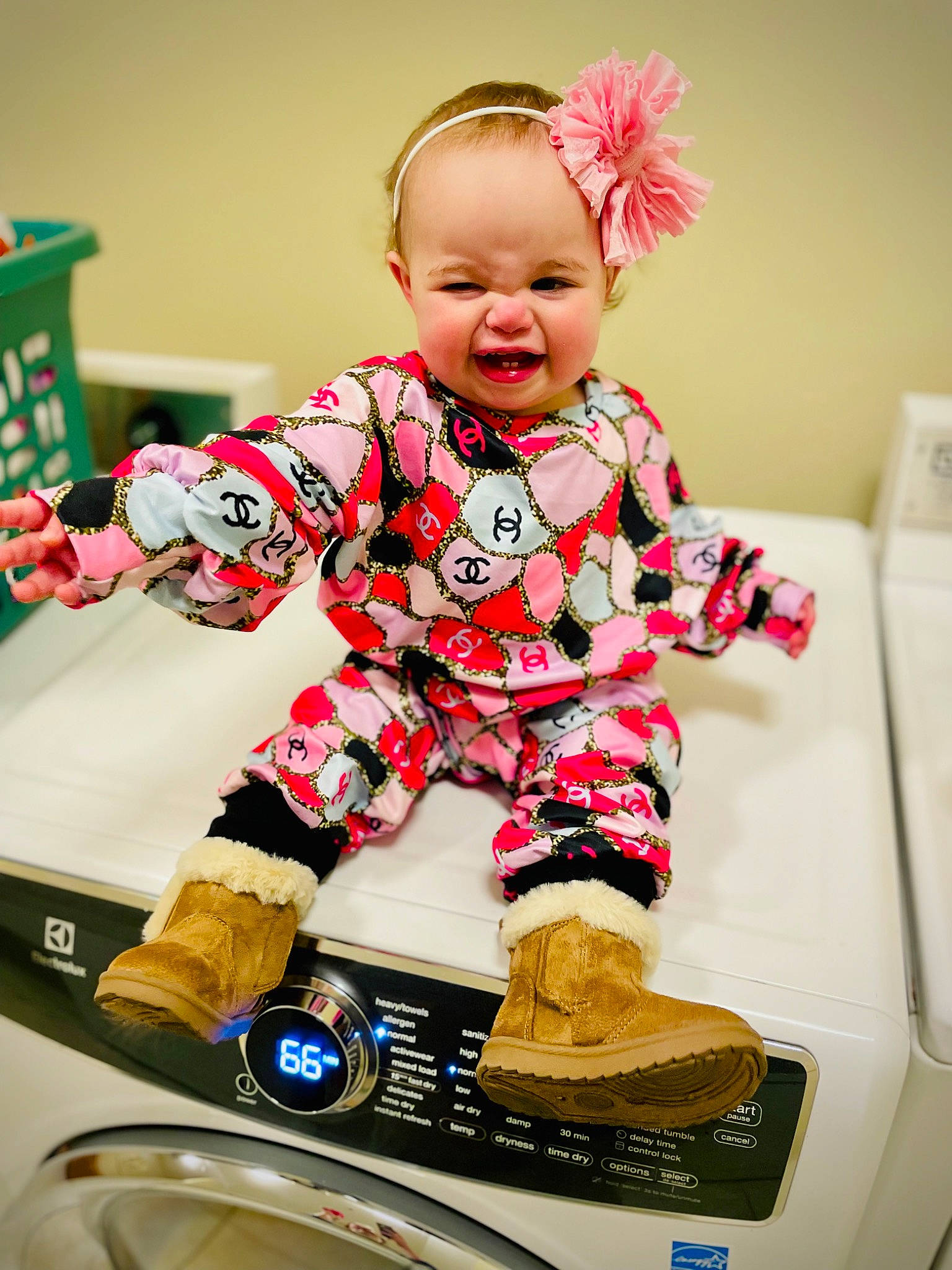Morrelli is registered to the contest to win money with this photo: baby, baby_playing_with_toys, baby_toddler_clothing, child, eye, fun, happy, head, magenta, motor_vehicle, pattern, person, pink, sitting, sleeve, smile, tire, toddler, toy, vehicle