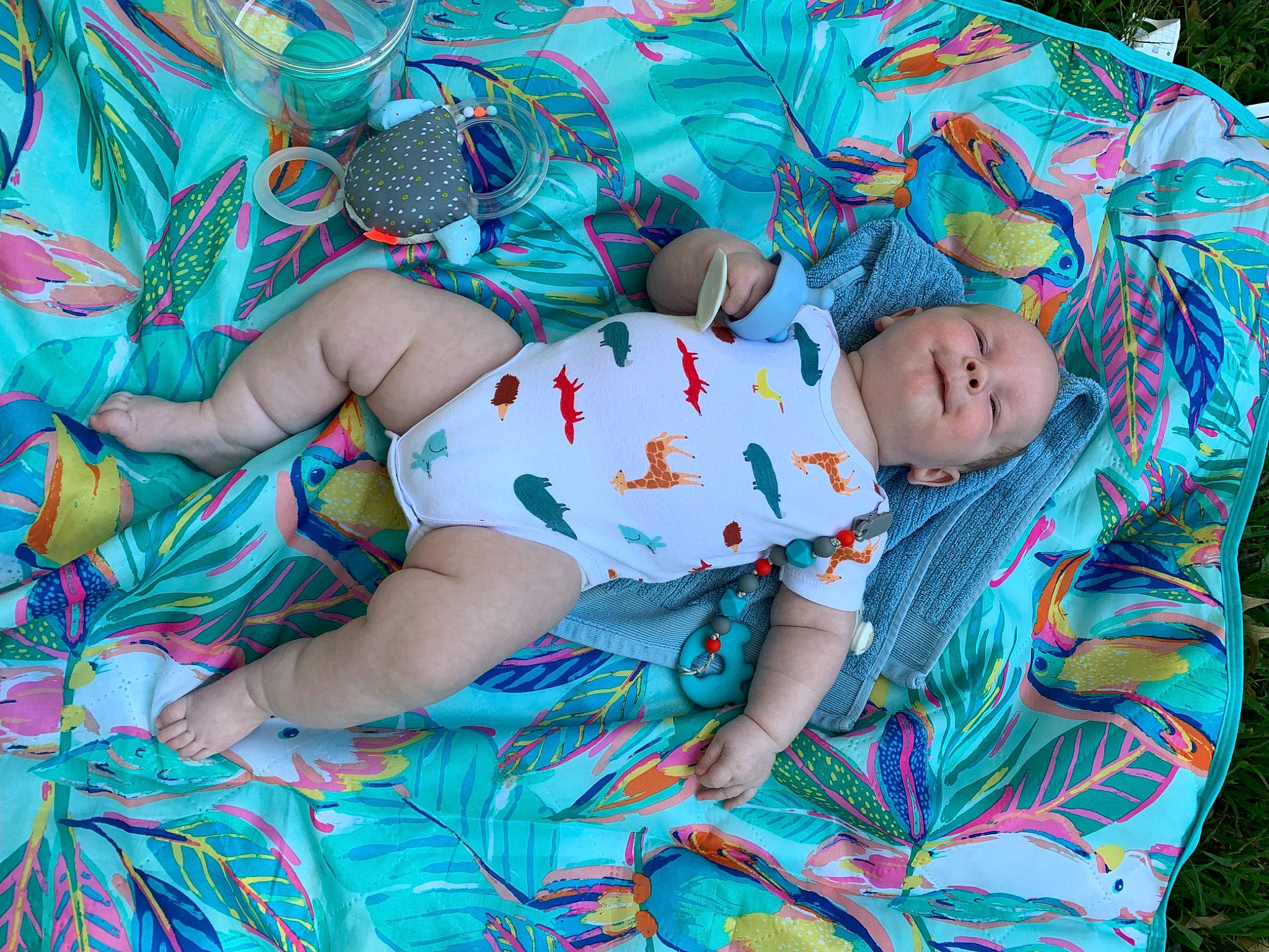 Gavyn joined the competition — help win amazing prizes! aqua, azure, baby, baby_toddler_clothing, blue, comfort, dress, electric_blue, fun, grass, happy, leisure, linens, pattern, people_in_nature, person, shorts, sitting, sleeve, textile