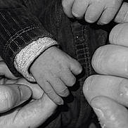 Xavy participe au concours pour gagner de l'argent avec cette photo : baby, hands, fingers, black_and_white, close_up, infant, grip, skin, adult, contrast, clothing, texture, bond, love, touch, wrinkles, nails, soft, tiny, family