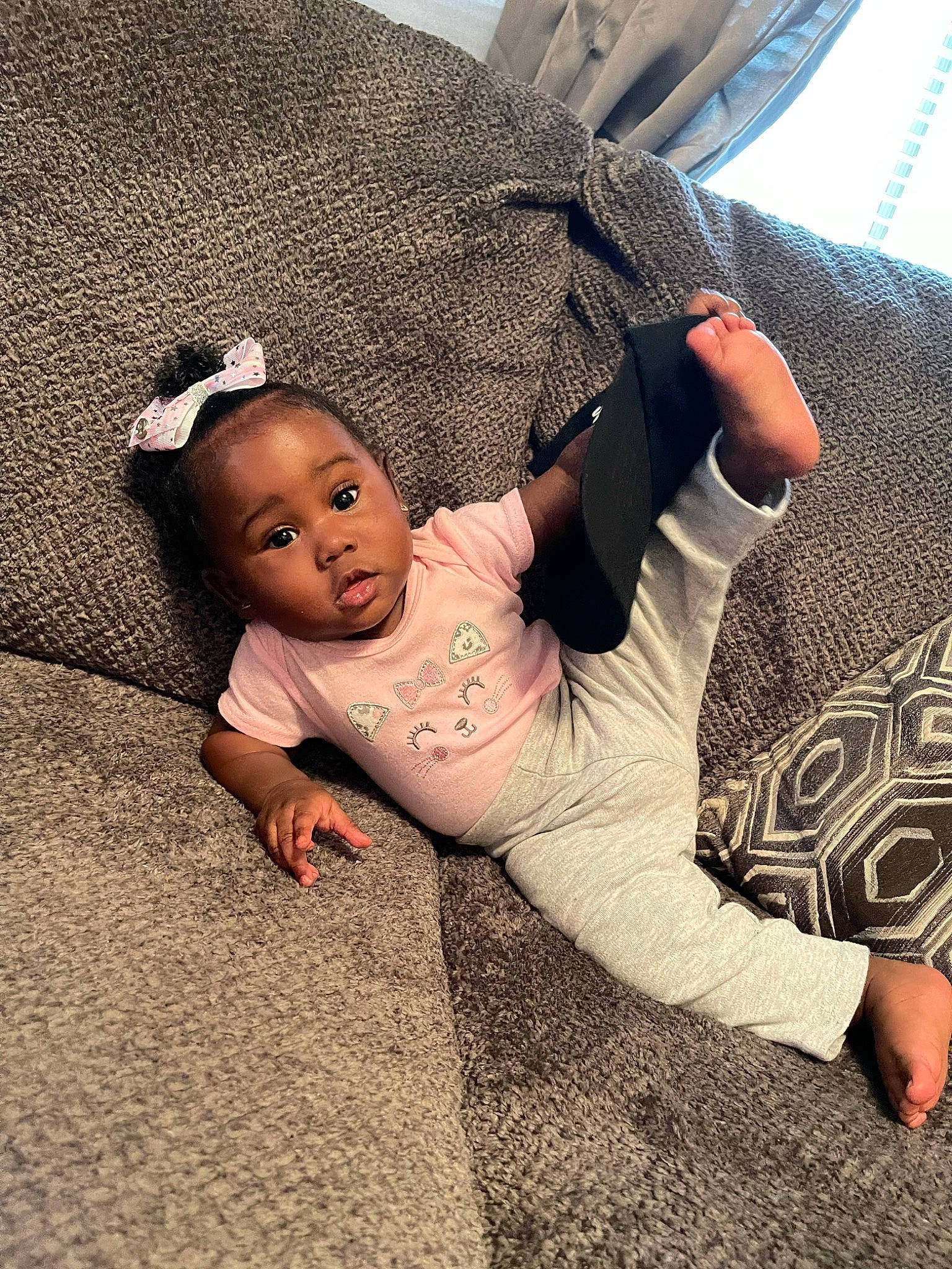 Beauty is registered to the contest to win money with this photo: baby, baby_toddler_clothing, comfort, cool, elbow, finger, flash_photography, floor, flooring, foot, gesture, grass, hand, happy, human, human_body, leg, person, thigh, toddler