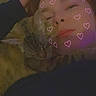 child, cat, tabby_cat, pet, cuddling, sleeping, face, portrait, indoor, bed, lying_down, heart_filter, pink_hearts, low_light, selfie, close_up, human, feline, cozy, affection