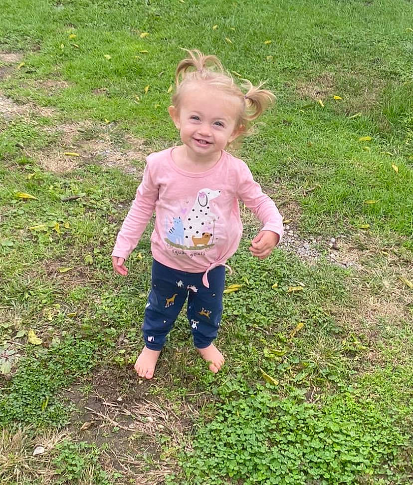 Kinslie is registered to the contest to win money with this photo: baby, baby_toddler_clothing, barefoot, botany, child, foot, fun, garden, grass, grass_family, grassland, groundcover, happy, joy, lawn, meadow, people_in_nature, person, plant, smile