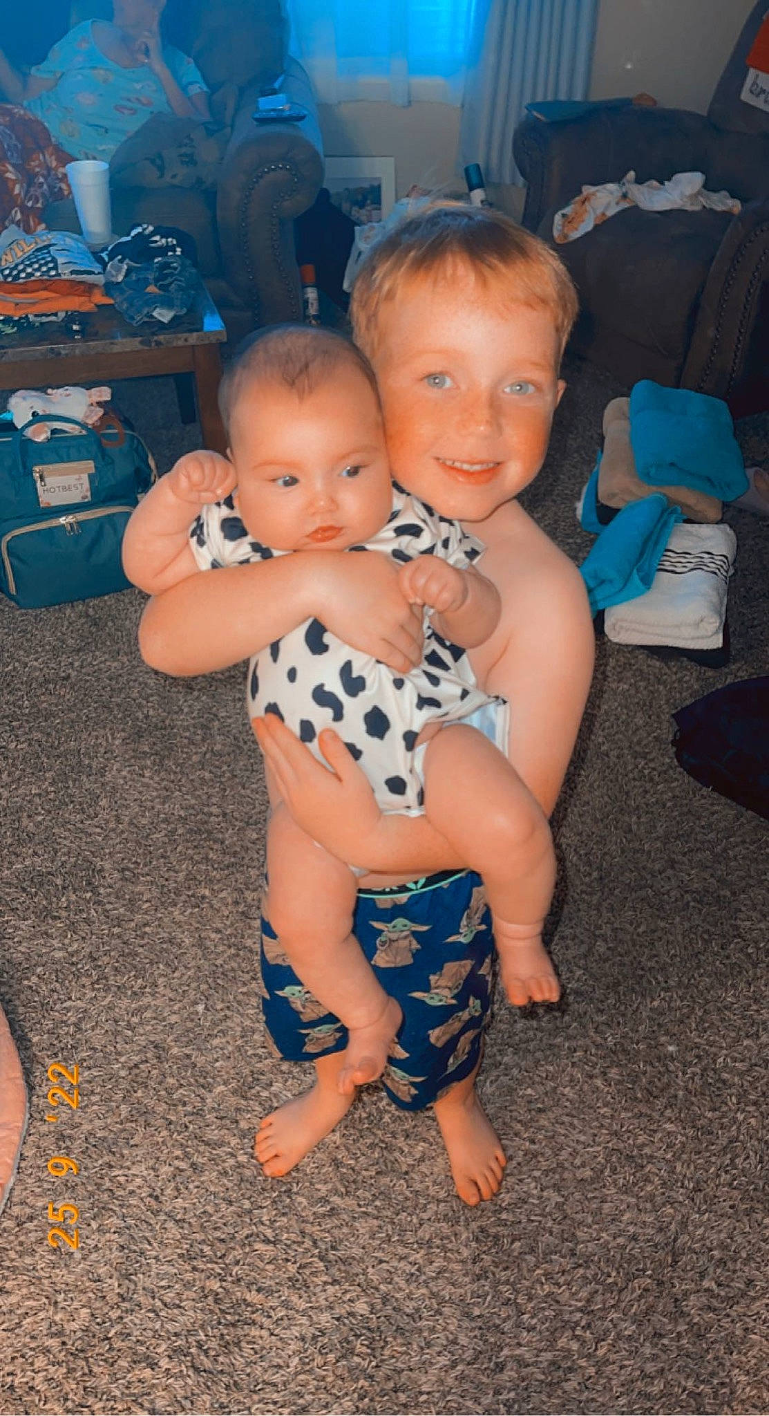 Mara is registered to the contest to win money with this photo: abdomen, azure, baby_toddler_clothing, chair, child, event, flooring, foot, fun, happy, head, human_body, human_leg, iris, joy, person, skin, smile, thigh, thumb