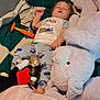 Jordan joined the competition — help win amazing prizes! toddler, sleeping, blanket, plush_toy, elephant, toy, pajamas, child, bed, comfort, nap, indoor, soft, cute, rest, peaceful, clothing, stuffed_animal, relaxation, infant