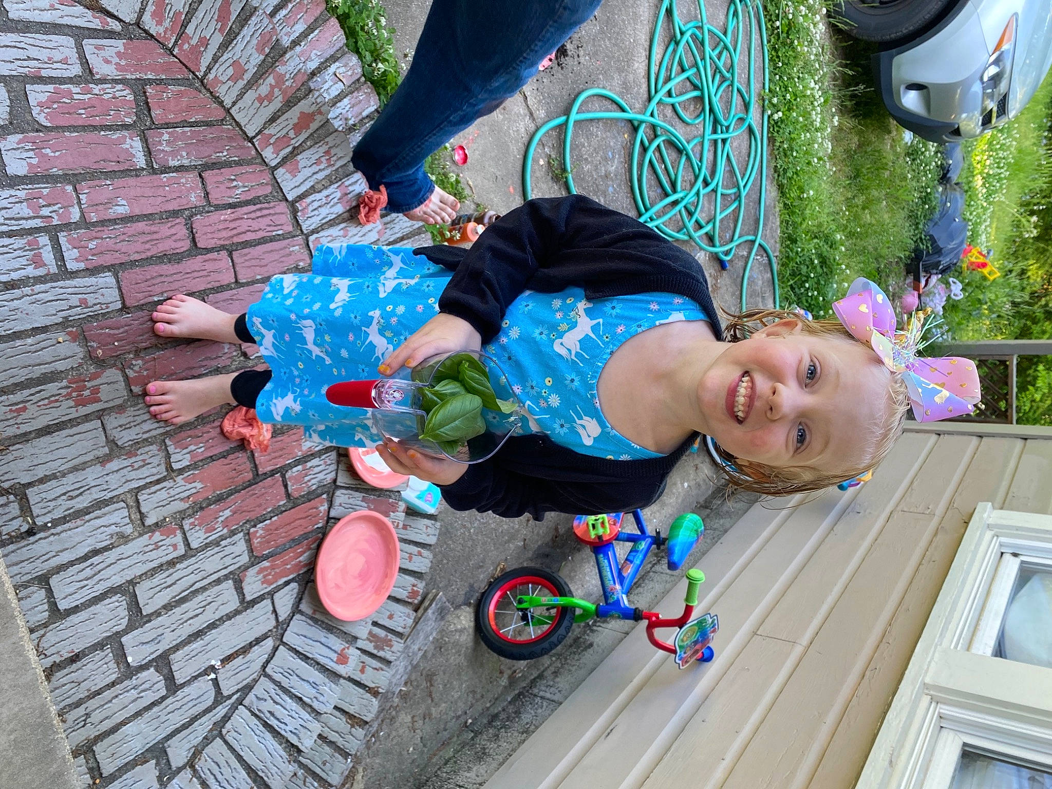Kinsleigh is registered to the contest to win money with this photo: baby, baby_toddler_clothing, balloon, brick, child, electric_blue, fun, grass, green, happy, joy, leisure, person, pink, plant, play, recreation, shorts, smile, t_shirt