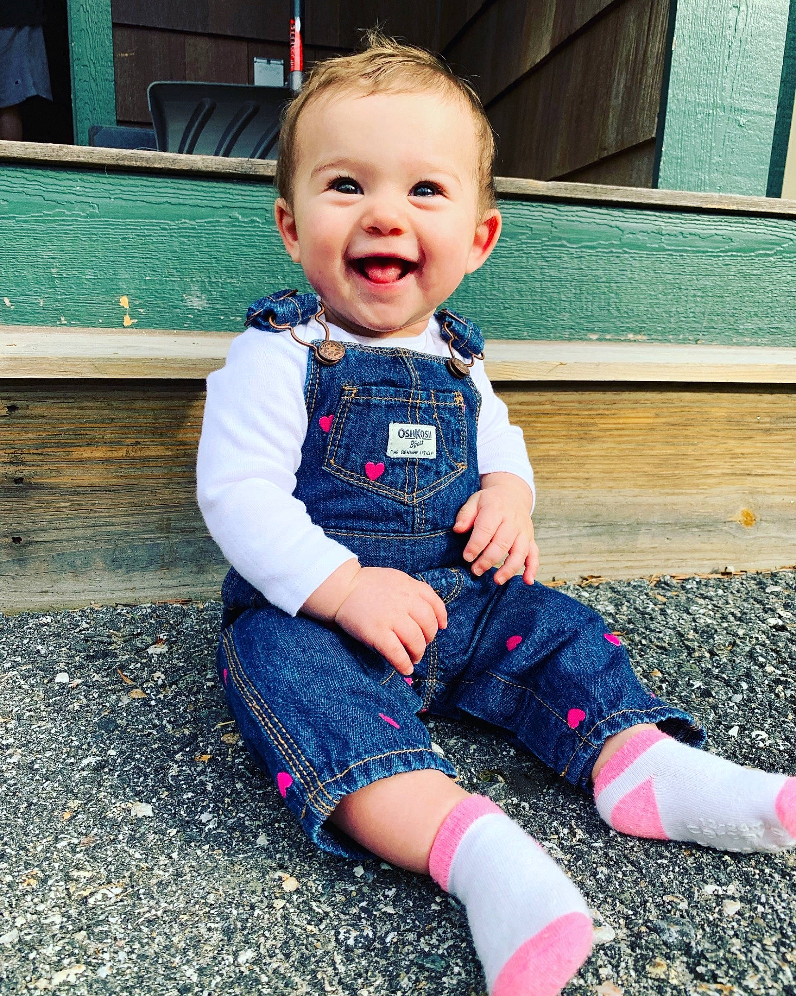 Miah joined the competition — help win amazing prizes! baby, beauty, cheek, child, design, face, footwear, head, jeans, joy, leg, outerwear, pattern, people, person, pink, plaid, sitting, skin, smile