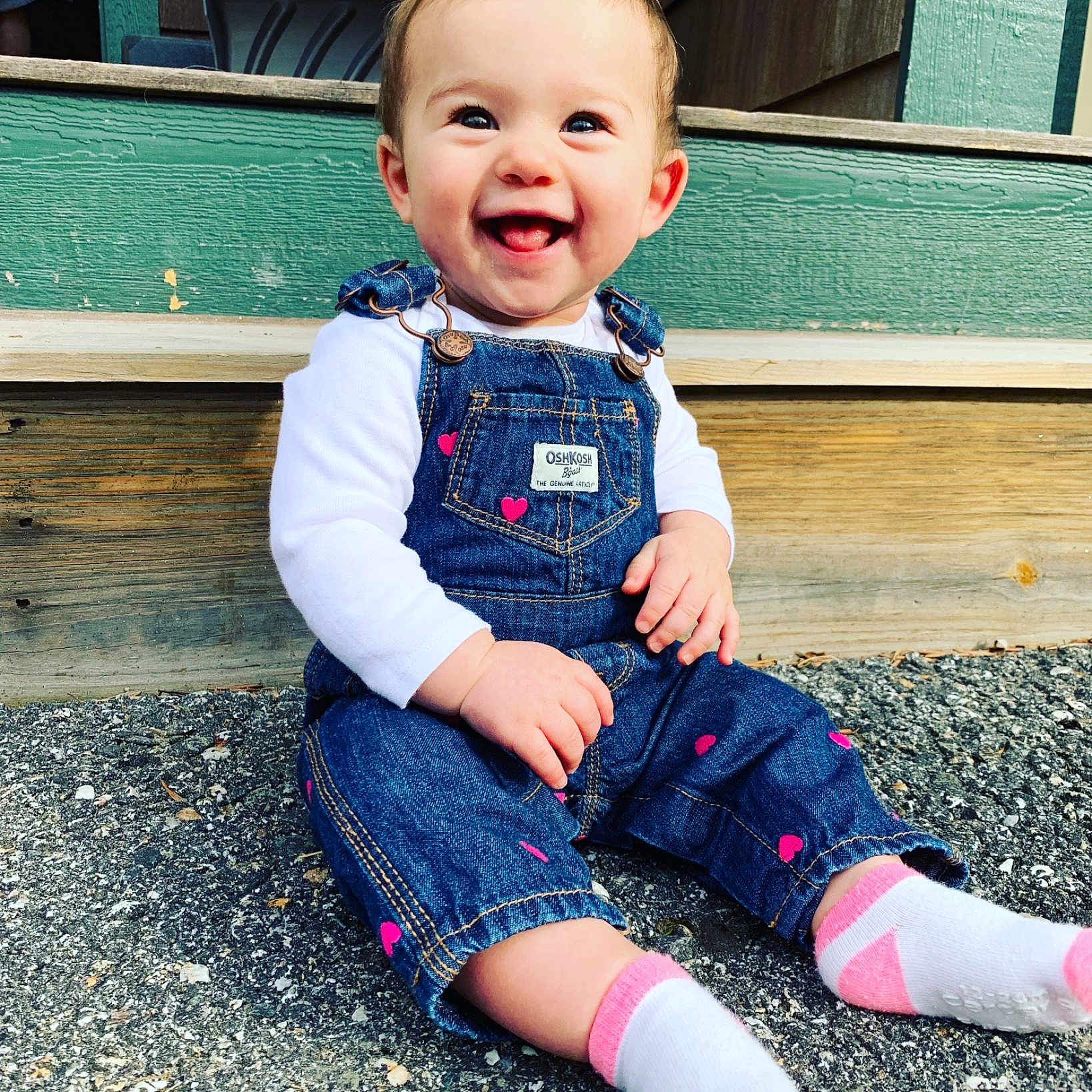 Miah joined the competition — help win amazing prizes! baby, beauty, cheek, child, design, face, footwear, head, jeans, joy, leg, outerwear, pattern, people, person, pink, plaid, sitting, skin, smile
