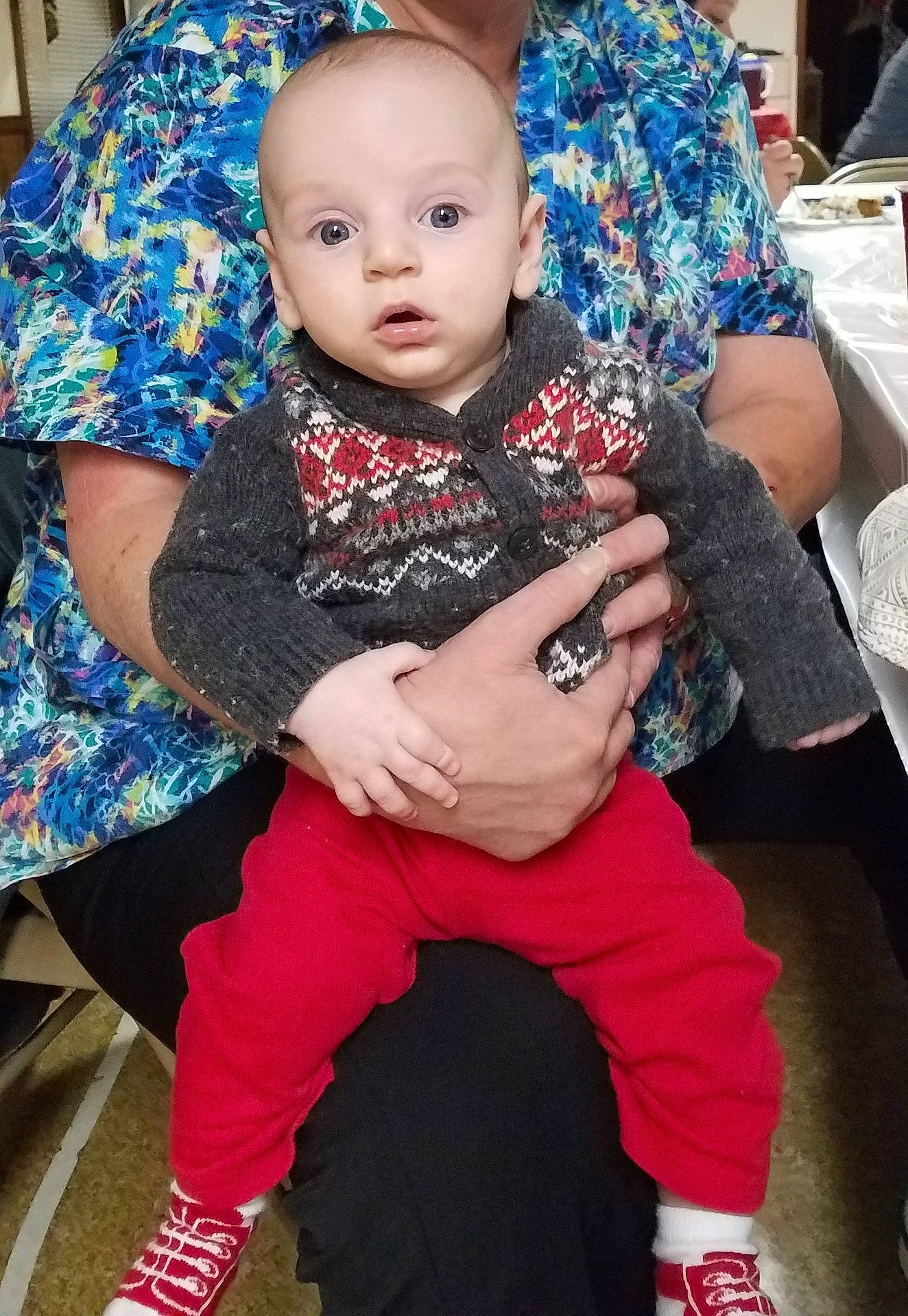 Conway is registered to the contest to win money with this photo: arm, child, day, girl, human_hair_color, infant, outerwear, pattern, person, product, skin, surprise, textile, toddler