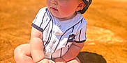 Caleb joined the competition — help win amazing prizes! baby, child, baseball, cap, sportswear, dirt, sunlight, outdoor, cute, sitting, hand, jersey, pinstripes, young, playing, field, person, hat, summer, daylight