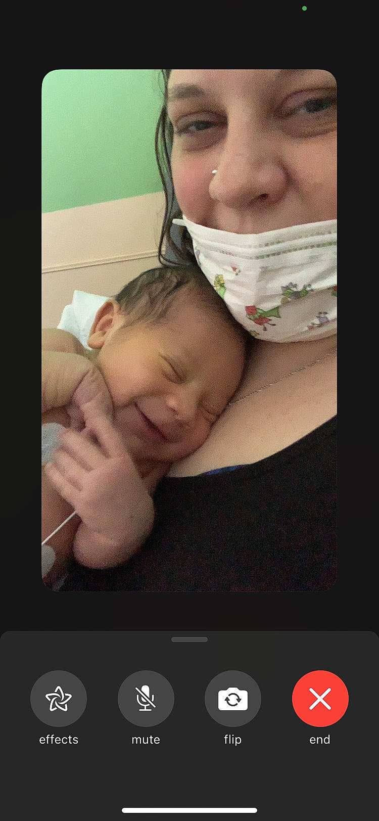 Marlo is registered to the contest to win money with this photo: baby, baby_toddler_clothing, cheek, comfort, communication_device, eyebrow, eyelash, face, facial_expression, finger, gesture, happy, mouth, nose, organ, person, photograph, product, skin, smile