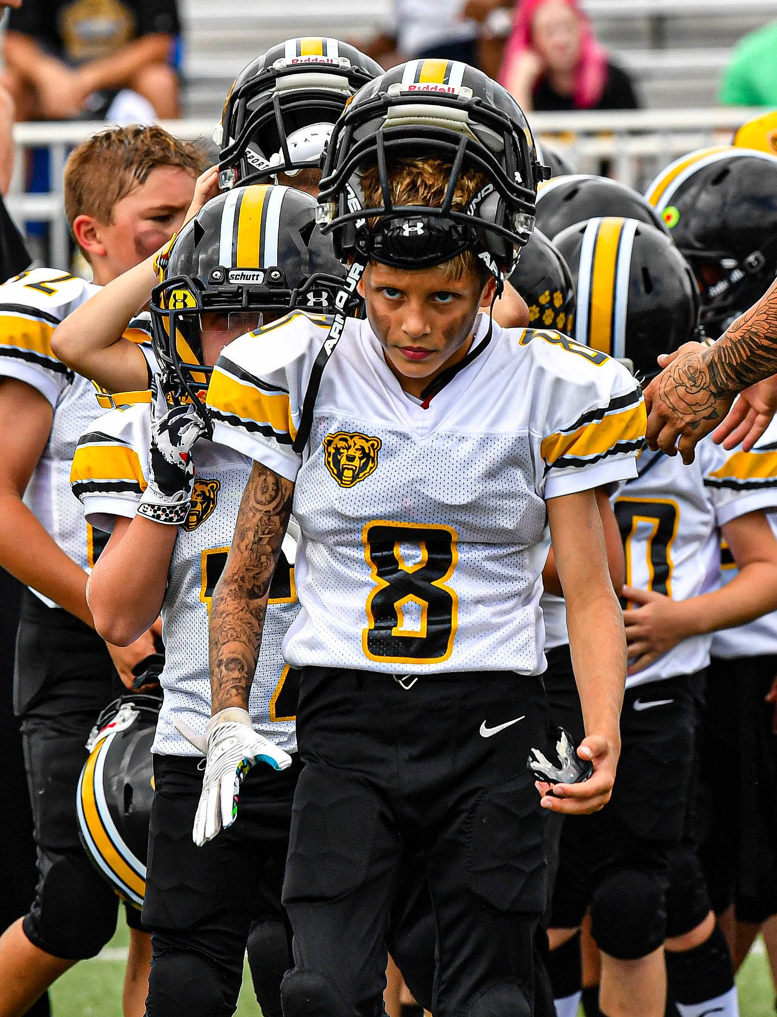 Noah is registered to the contest to win money with this photo: american_football, blurred, canadian_football, face_mask, fan, football_equipment, football_gear, football_helmet, gridiron_football, headwear, helmet, jersey, person, player, shorts, sports_equipment, sports_gear, sports_jersey, sports_uniform, sportswear