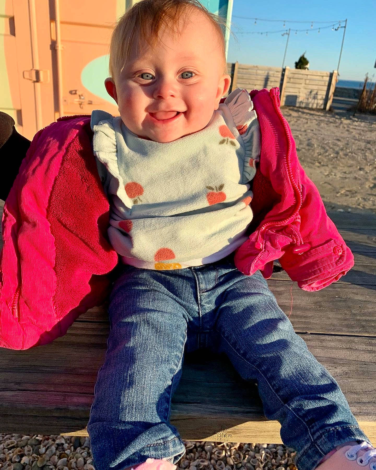 Elliana is registered to the contest to win money with this photo: baby_toddler_clothing, cheek, child, cool, denim, face, facial_expression, fun, grass, hairstyle, happy, joy, leisure, orange, people_in_nature, person, pumpkin, skin, sky, sleeve