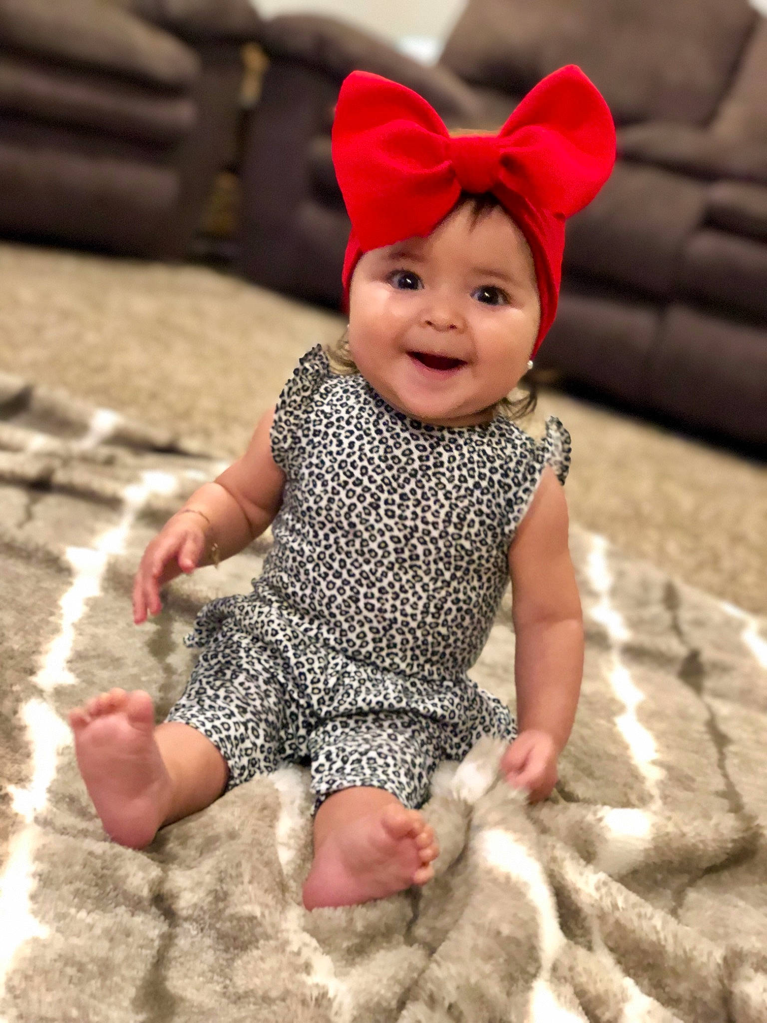Camila Rose is registered to the contest to win money with this photo: baby, baby_toddler_clothing, beanie, cap, child, child_model, clothing, ear, fashion_accessory, fun, fur, hat, headgear, joy, outerwear, person, pink, sleeve, smile, toddler