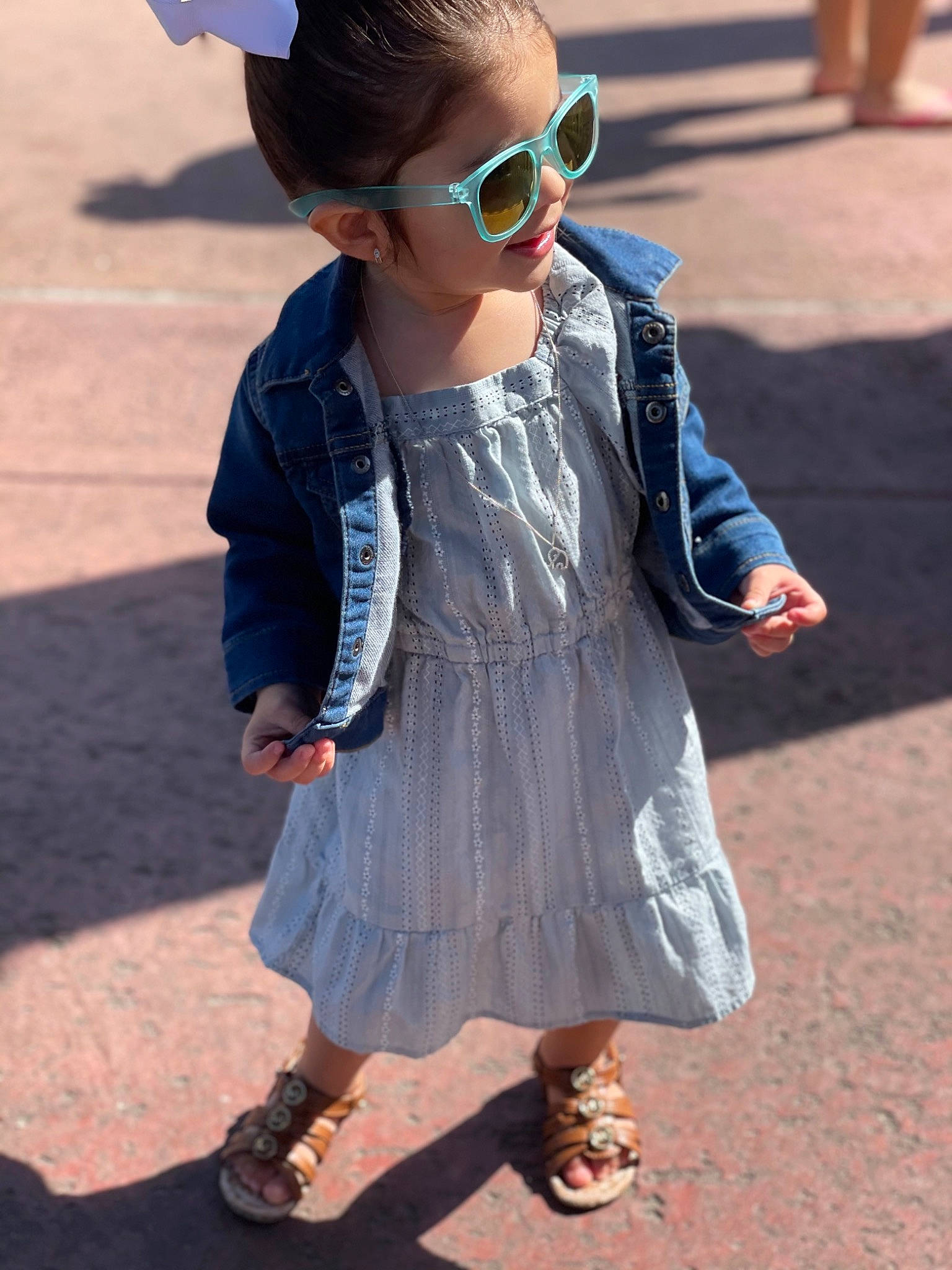 Camila joined the competition — help win amazing prizes! asphalt, dress, eyewear, face, goggles, hair, head, headgear, neck, person, photograph, plaid, shoe, sleeve, street_fashion, sunglasses, t_shirt, tartan, toddler, vision_care