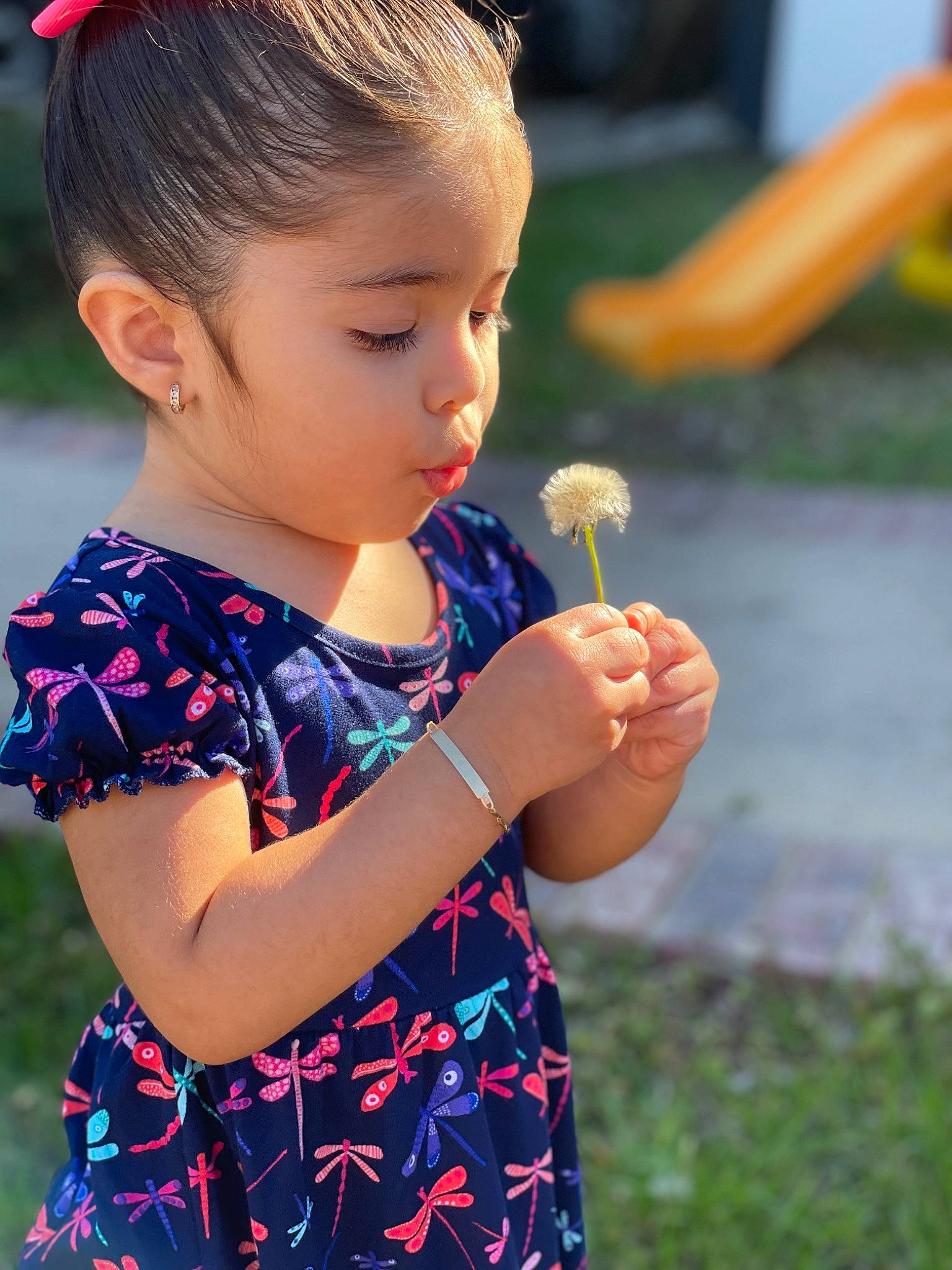 Camila joined the competition — help win amazing prizes! child, electric_blue, facial_expression, finger, fun, gesture, grass, hair, hairstyle, happy, head, neck, nose, organ, person, plant, skin, sleeve, summer, thumb
