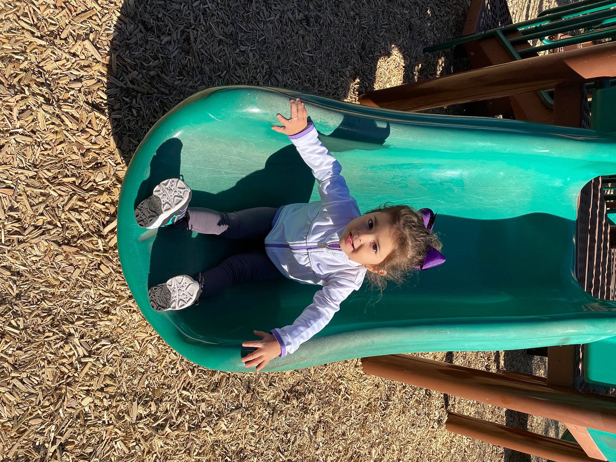 Camila joined the competition — help win amazing prizes! aqua, azure, chute, electric_blue, fun, grass, green, human_settlement, leisure, mammal, outdoor_play_equipment, outdoor_recreation, person, playground, playground_slide, public_space, recreation, shade, tints_and_shades, toddler
