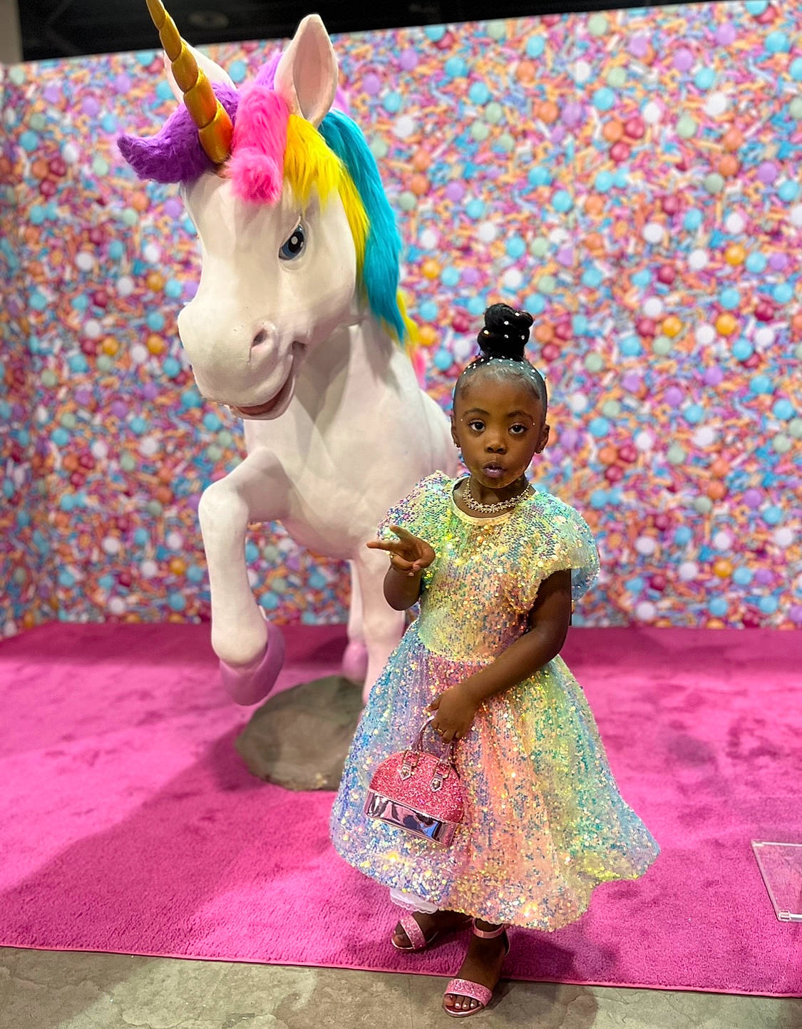 Vanari joined the competition — help win amazing prizes! animation, child, costume, day_dress, entertainment, event, fashion_design, figurine, flooring, fun, fur, happy, magenta, mythical_creature, one_piece_garment, pattern, person, pink, sandal, toy