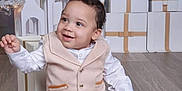 Ezariah joined the competition — help win amazing prizes! baby, babylaughing, box, clothing, face, festival, footwear, happy, head, openingpresent, person, shoe, sitting, sleeve, smile
