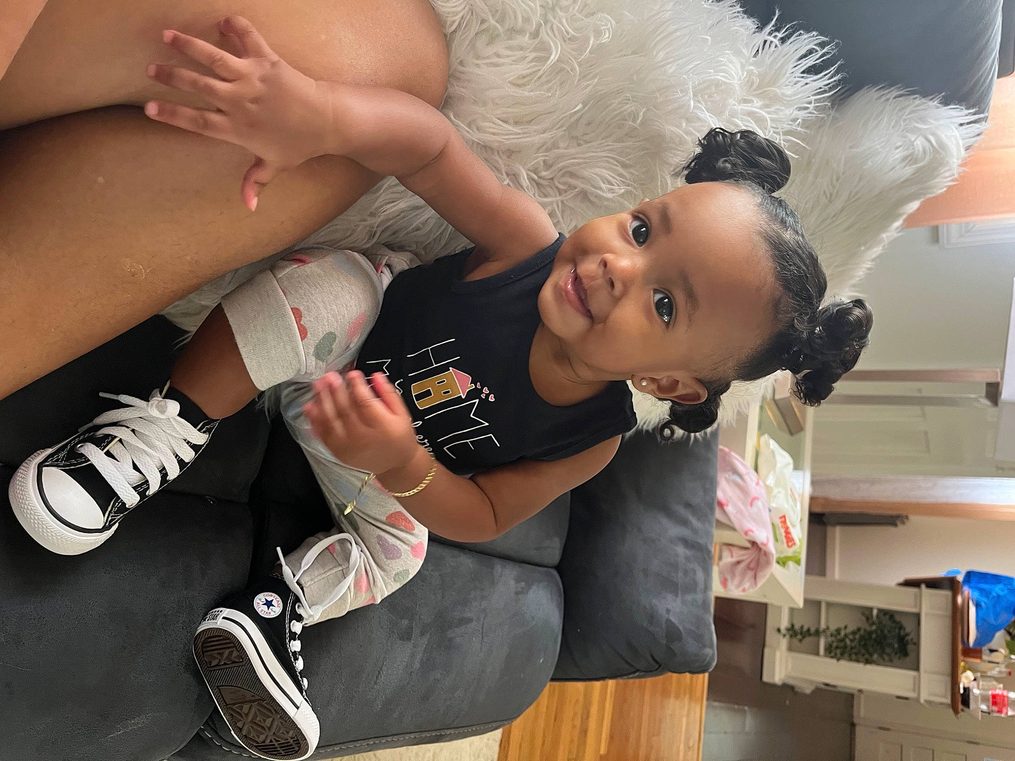 Adelyn is registered to the contest to win money with this photo: arm, baby, elbow, finger, flash_photography, foot, fun, gesture, hand, happy, human_leg, joint, knee, leisure, nail, person, snapshot, sock, thigh, toddler